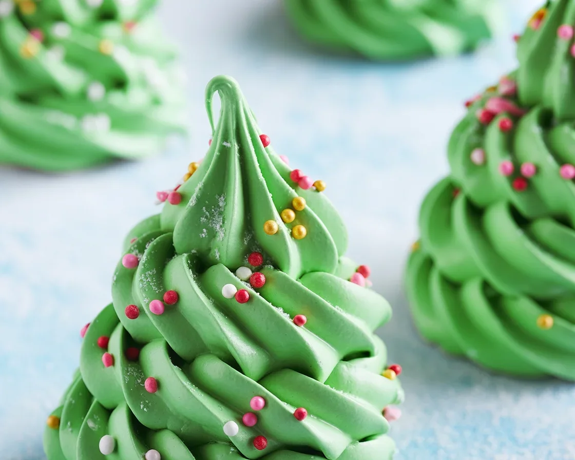 Festive Meringue Trees decorated for Christmas, light and airy holiday treats.