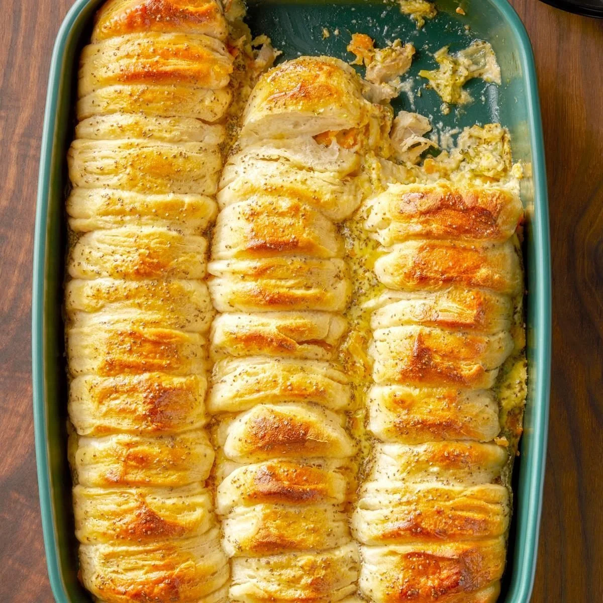 Delicious Chicken Biscuit Casserole topped with flaky biscuits