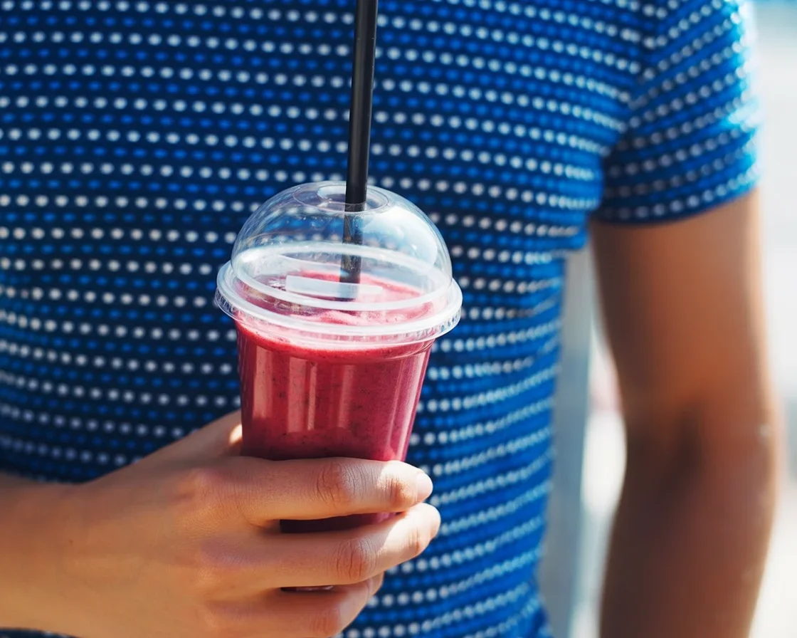 Delicious low-calorie smoothie with protein powder and fresh fruits